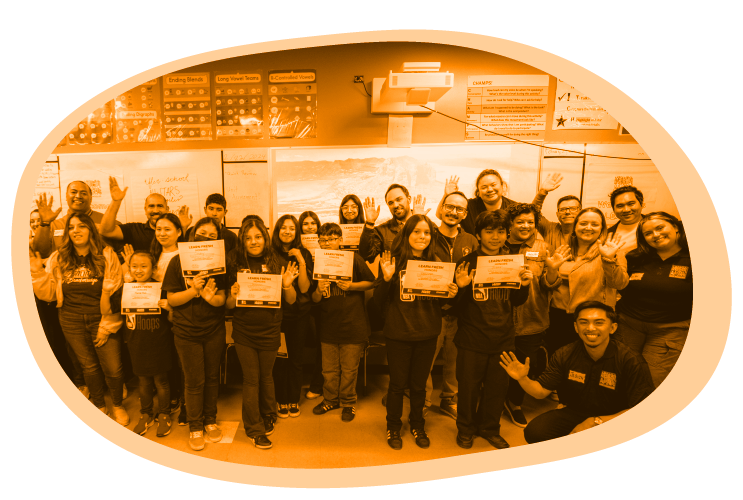 Members of Mizzen Education’s team with youth and staff from Learn Fresh and After-School All-Stars - LA; image is tinted orange, one of Mizzen Education’s primary brand colors.